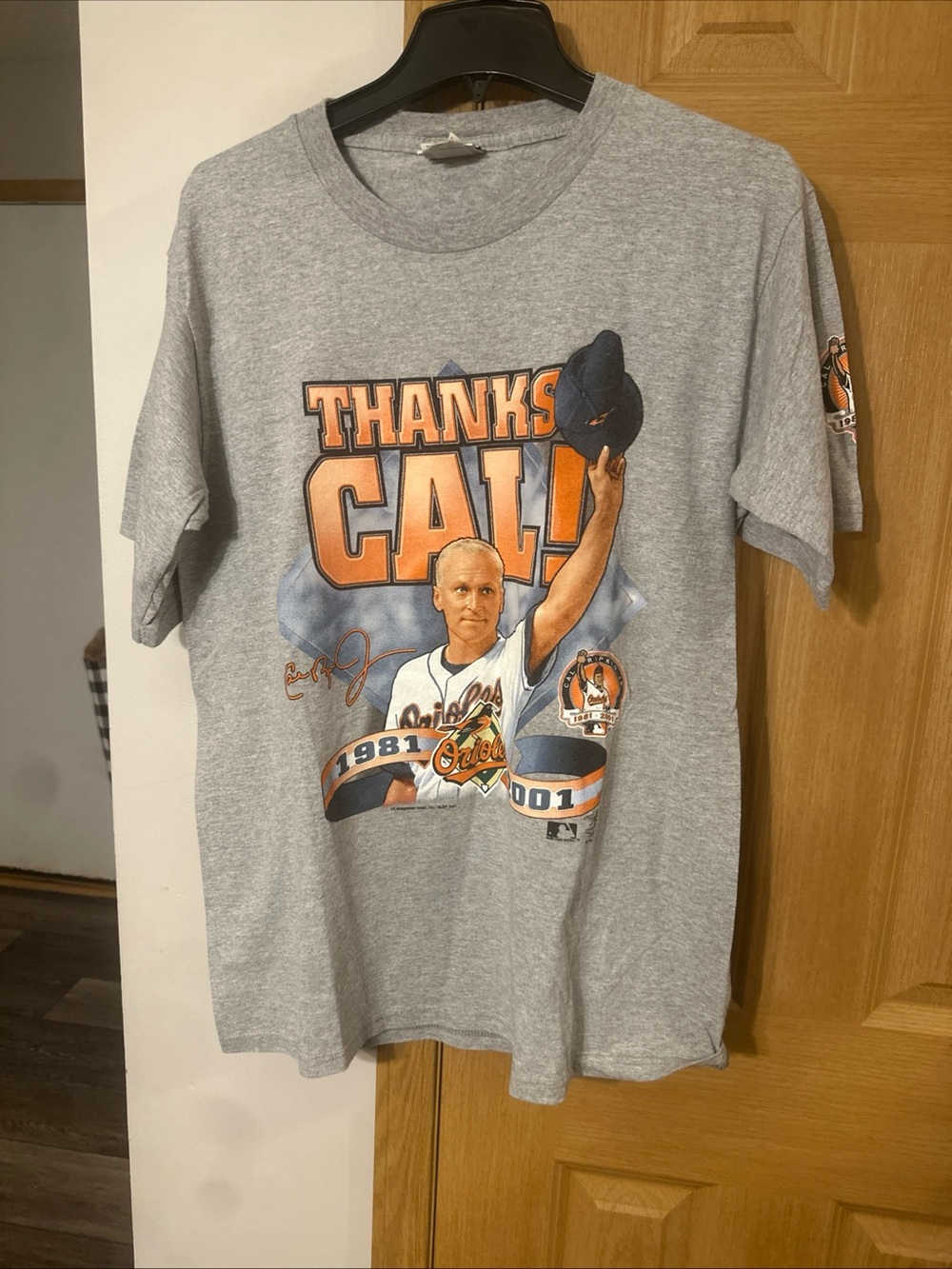 Lee Gray Tee with Orange & Navy Baltimore Orioles Tribute Graphic to Cal Ripkin
